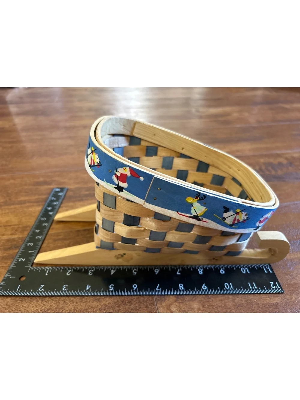 Handwoven Wooden Sled Basket with Festive Skiing Santa and Reindeer Trim